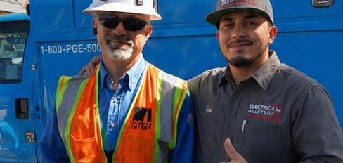 Electrical Allstar owner Tim with a PG&E representative